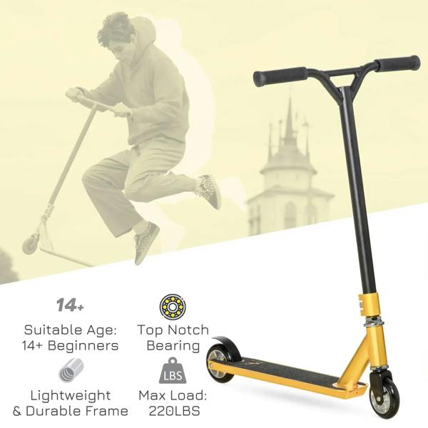 Gold and black stunt scooter standing upright with front wheel and deck edge visible