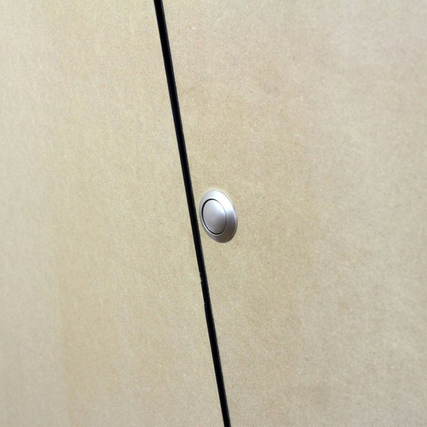 Close-up of the MDF Camper Van Kitchen Unit LHD showing a sleek, modern handle on a smooth, light-colored surface