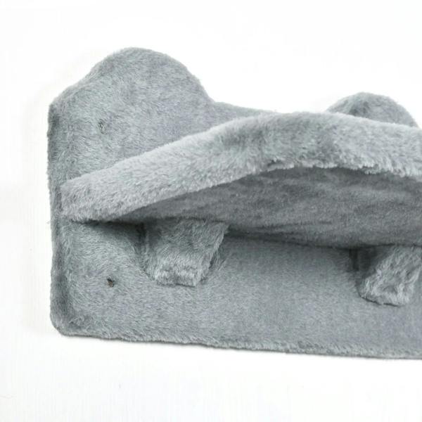 Close-up of grey plush cat shelf with raised edges and cushioned surface