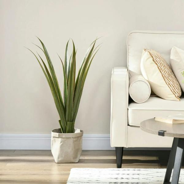 Artificial agave succulent plant in beige fabric pot cover, green spiky leaves