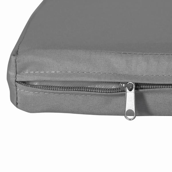 Dark grey cushion pad cover with visible zipper and metal pull tabs on seam