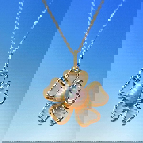 Freshwater pearl and mother-of-pearl floral necklaces crafted in luxury gold vermeil.