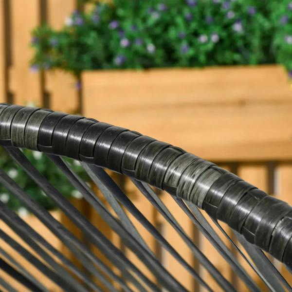 Close-up of black rattan wicker weave on egg chair frame