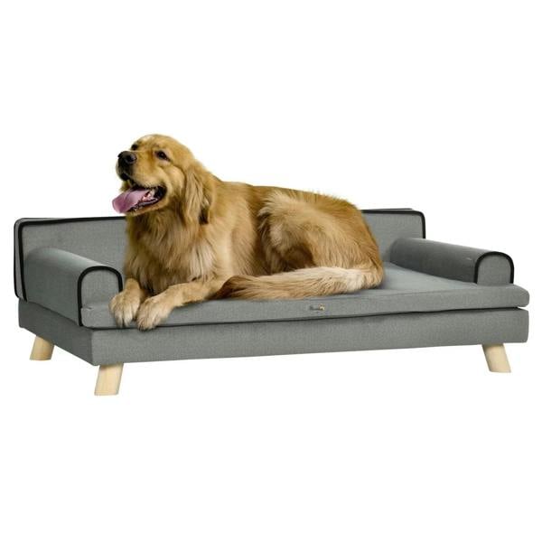 Grey fabric dog sofa with wooden legs and curved armrests