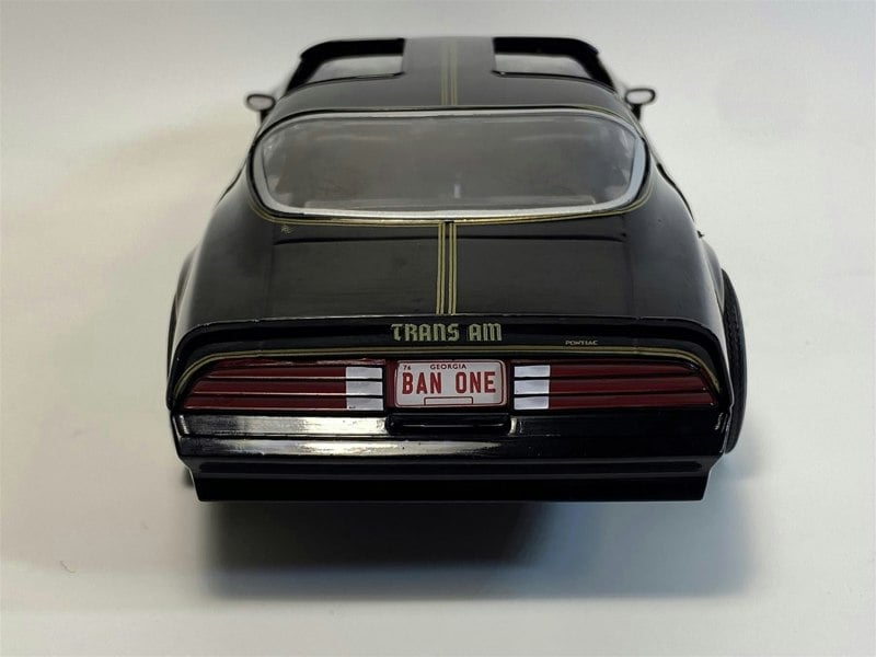 the back of a black toy car