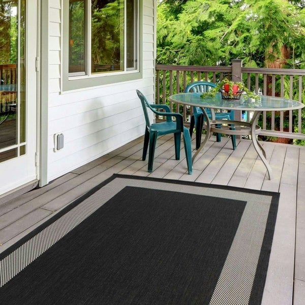 Outdoor Black Bordered Rug Weather resistant, Durable.