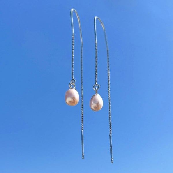 Dainty pearl threader earrings crafted from sterling silver by LENAE London featuring orchid pearls.