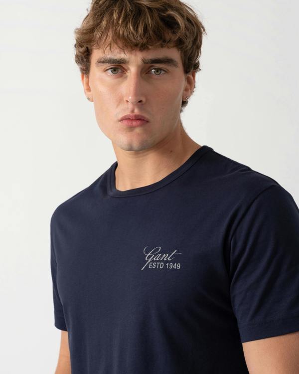 Close up of GANT Mens Short Sleeve Small Graphic Logo T-Shirt - 433 Evening Blue