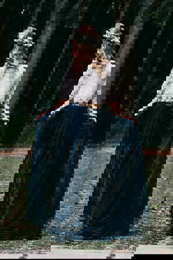 young girl holding dress