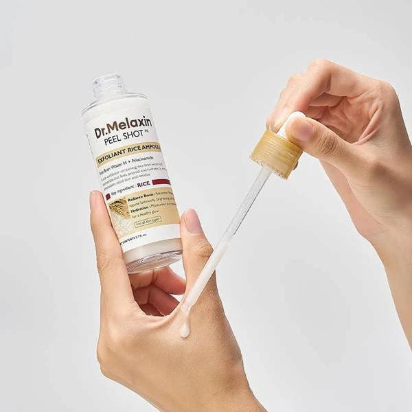 Lightweight, milky texture of Dr. Melaxin White Rice Ampoule – Fast-absorbing Korean chemical exfoliant for smooth skin at Atelier De Glow UK. 