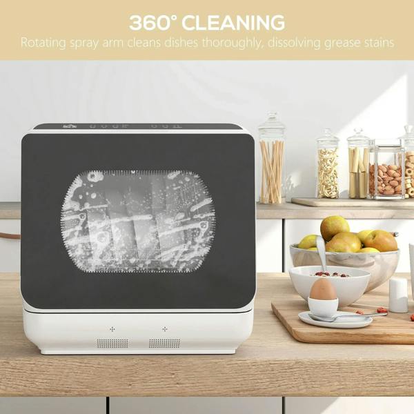 White countertop dishwasher with dark door window showing rotating spray pattern