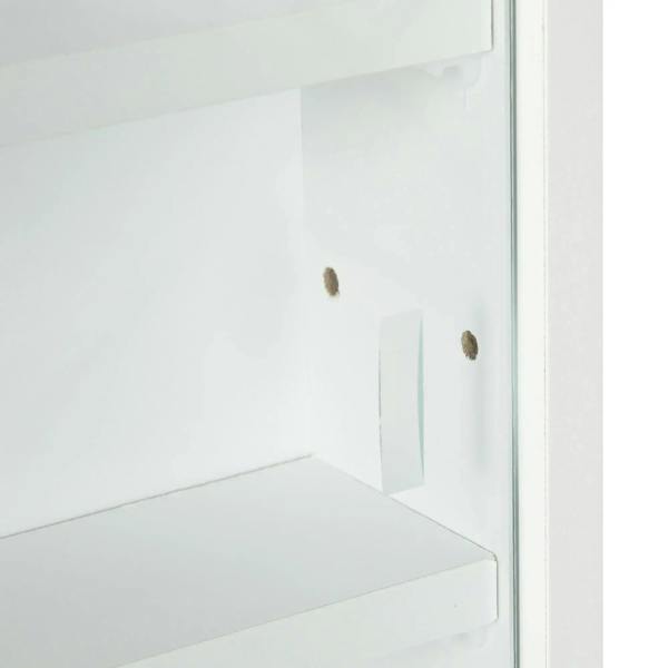 White glass door side detail with handle and mounting hardware on cabinet