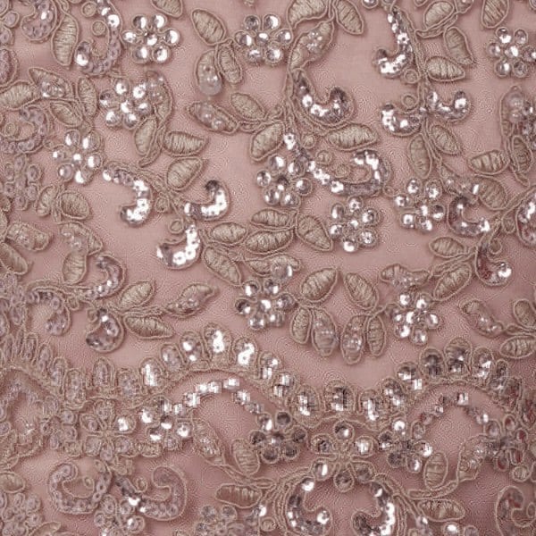 beaded detail on a girls mauve coloured dress