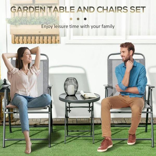 Light grey patio chair set with small round glass-top table for outdoor seating