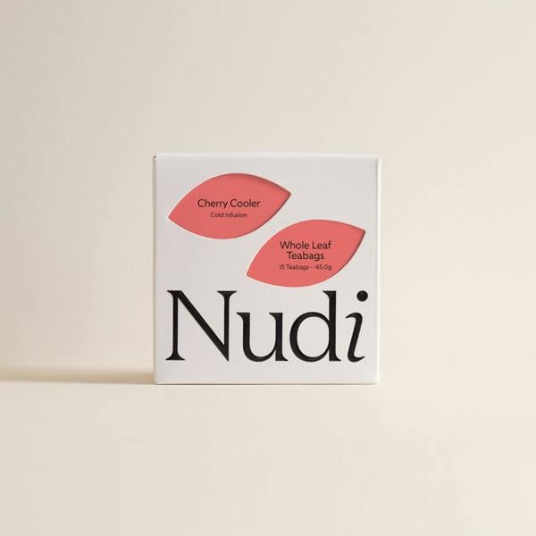 Nuditea Cherry Cooler: A refreshing fruit-based cold infusion and iced tea blend in plastic free whole leaf teabags.