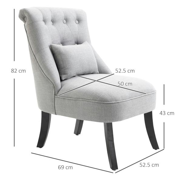 Grey upholstered tub dining chair with tufted back, square wooden legs, and matching throw pillow