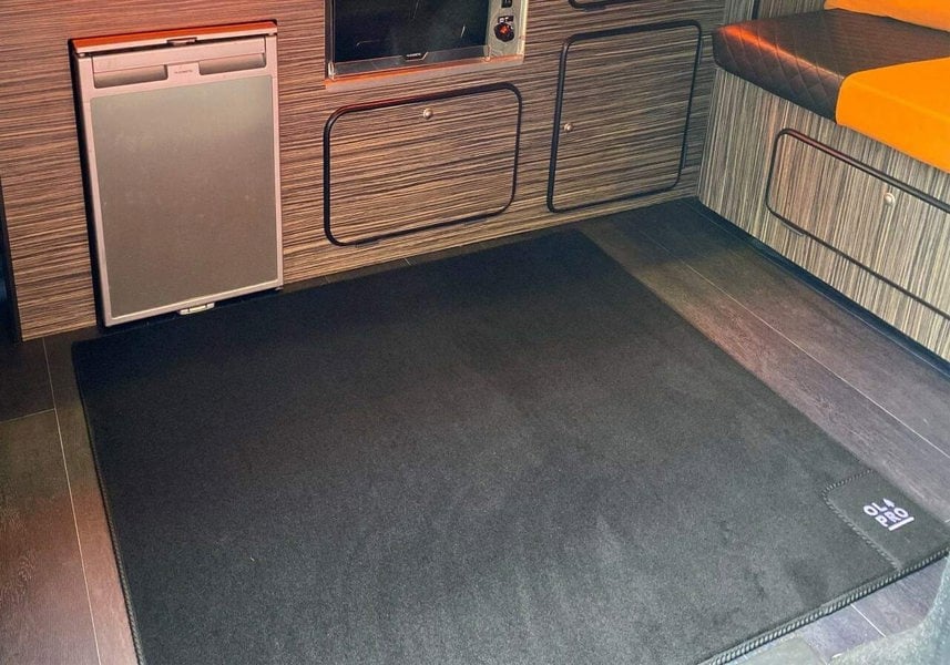 A photo of the Rear Campervan Living Area Carpet 900mm x 1000mm being used within a campervan on the living space of the vehicle.