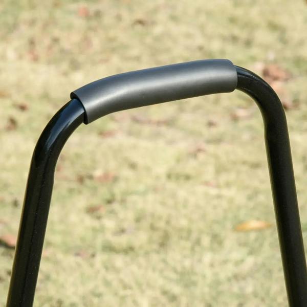 Curved black handle of a dark green steel lawn roller