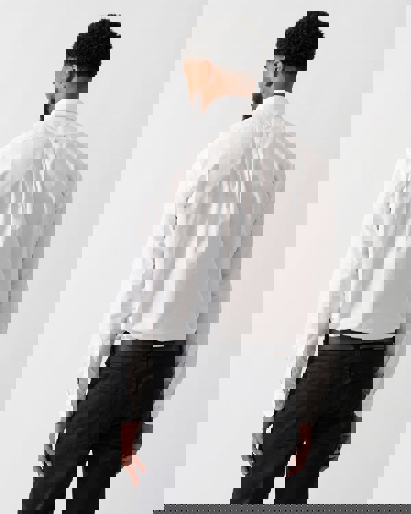 Back shot of a model wearing a BOSS Orange Rickert Mens Shirt in Natural colourway