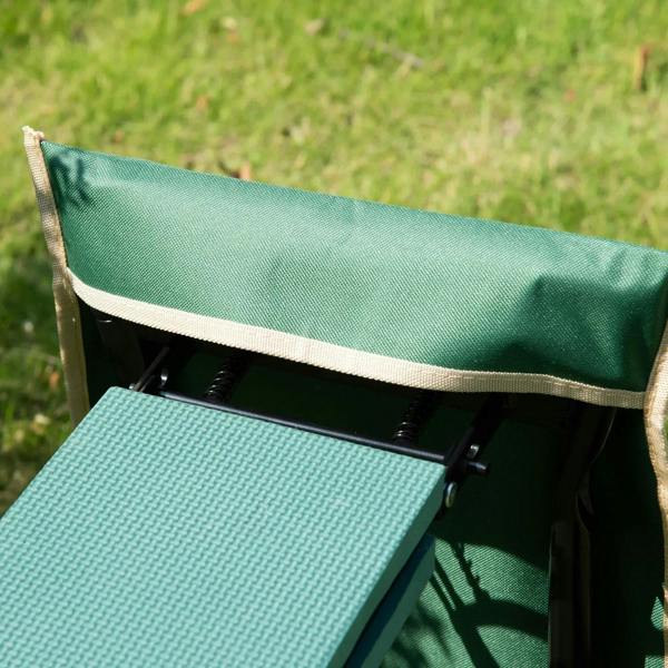 Close-up of green cushioned kneeling pad on black steel garden kneeler frame