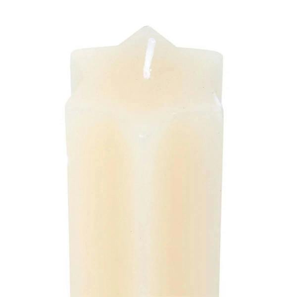 Cream star-shaped taper candle close-up showing star top and wick
