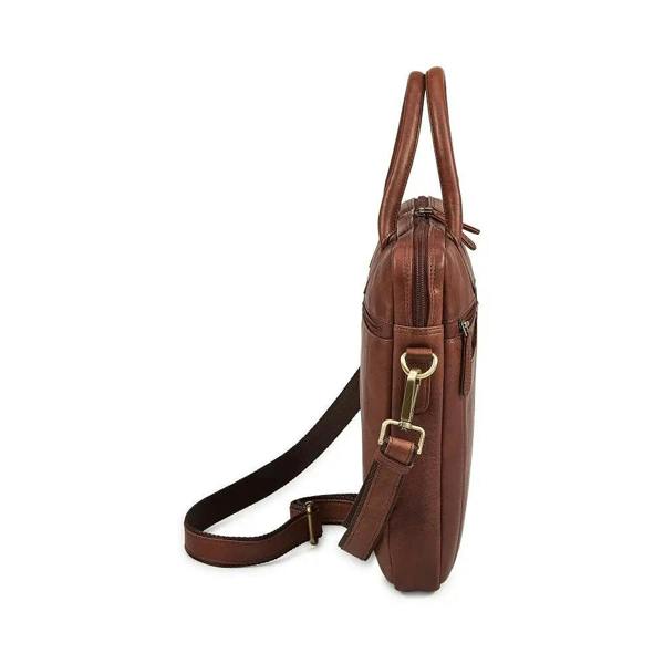 Brown leather bag with shoulder strap on a white background