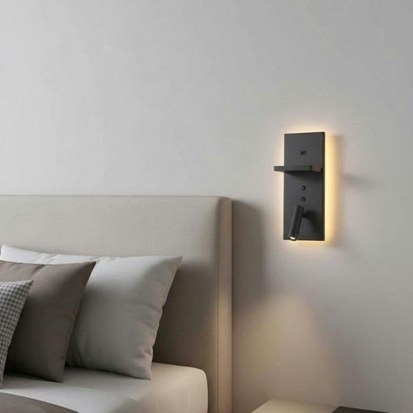 black bedroom wall lamp with reading light mounted on the wall in a modern bedroom
