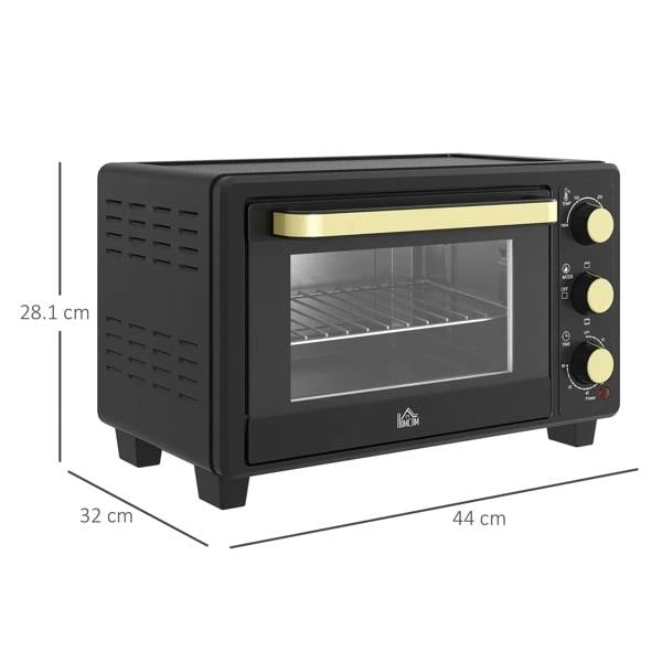 Black countertop toaster oven with glass door, gold bar above window, and knobs