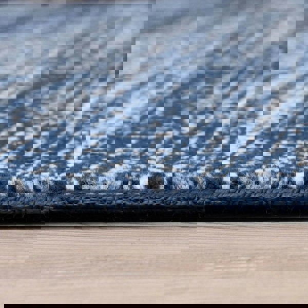 Blue colour rug, Non-shedding, stain-resistant, and pet-friendly.