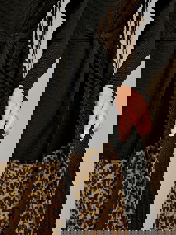 GWD Iris Knitted Roll Neck Tie Top