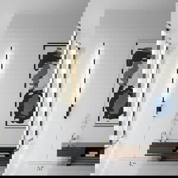 Interior black wall light set on a neutral wall colour in a modern home