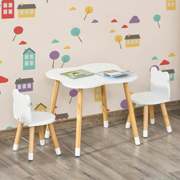 Kids table and chair set with white tabletop, two white bear chairs, and light wood legs