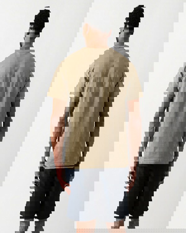 Back shot of a Model wearing a Belstaff Short Sleeved Mens Logo Patch T-Shirt in Fatigue Green