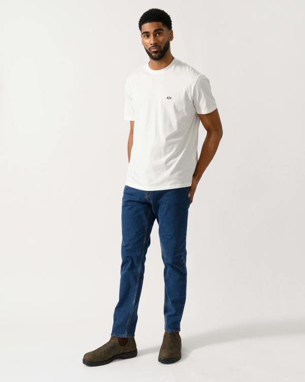 Full length shot of a Model wearing a Armani Exchange Mens A|X Monogram T-Shirt in Off White