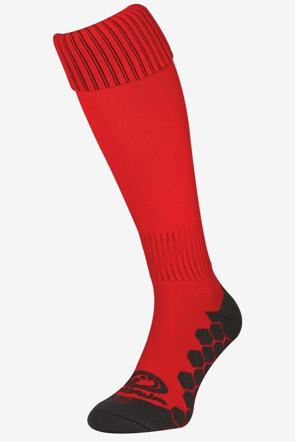 Single red Classico football sock, side view with black hexagonal grip sole on white - Optimum