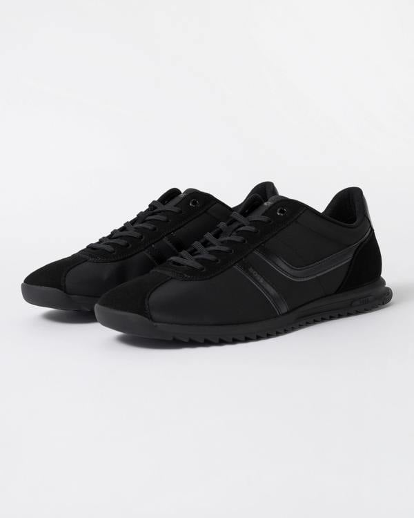 a pair of BOSS Orange Zayn Mens Logo Trainers with Faux Suede Trims in Black 005