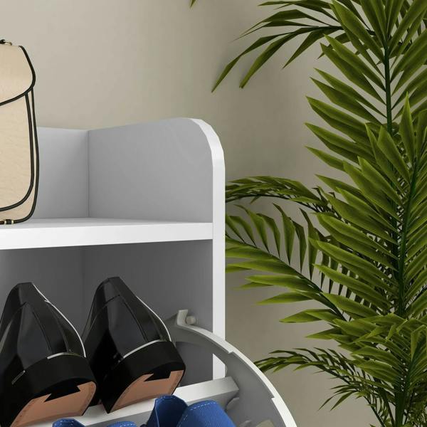 White shoe cabinet compartment with arched flip-door divider holding shoes