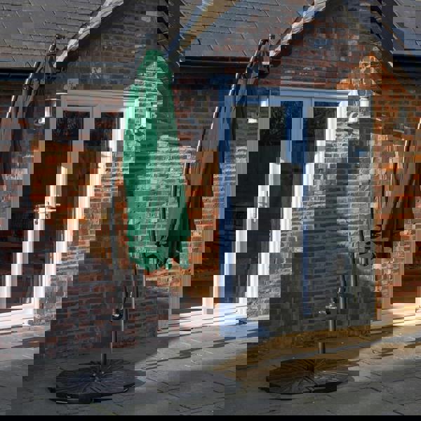 Samuel Alexander Outdoor 4 Person Round Glass Top Garden Dining Table Chairs With Green Banana Parasol and Base Set