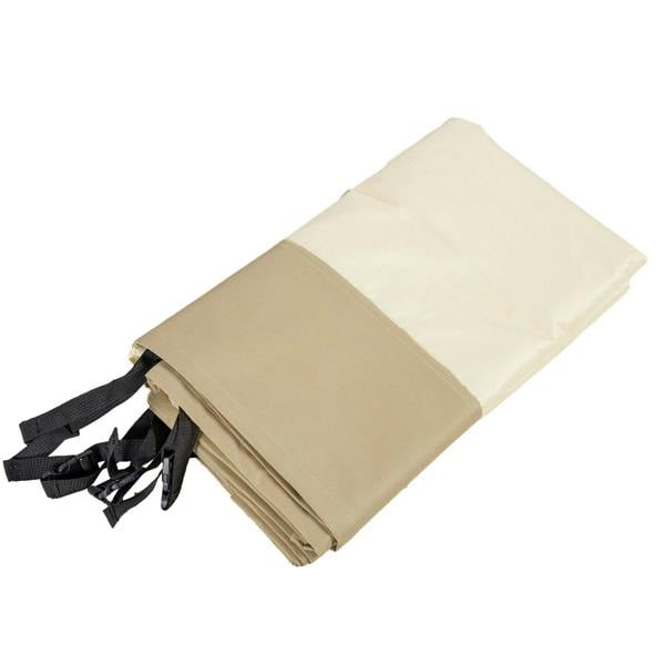 Folded beige PU grill cover with included black tie straps