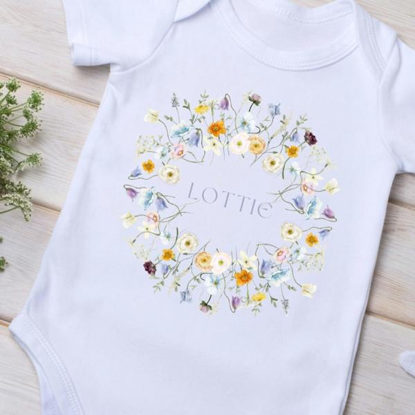 Personalised Baby Girl Spring Flowers Baby Grow, Vest or Bib with Name