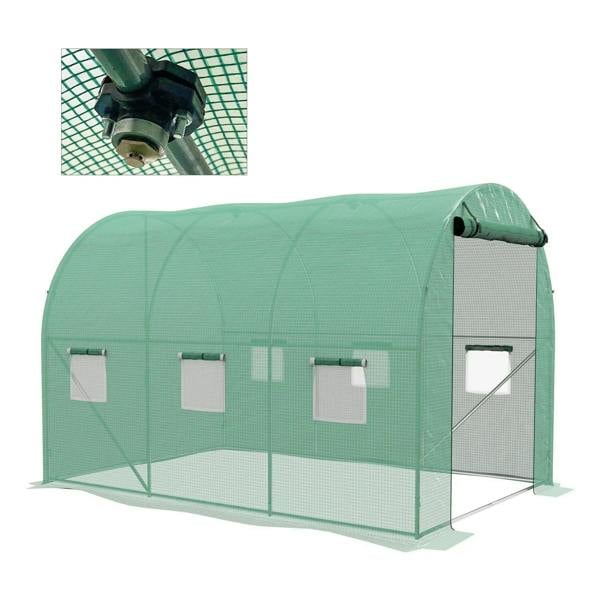Green polytunnel greenhouse with sprinkler valve and tubing on side frame