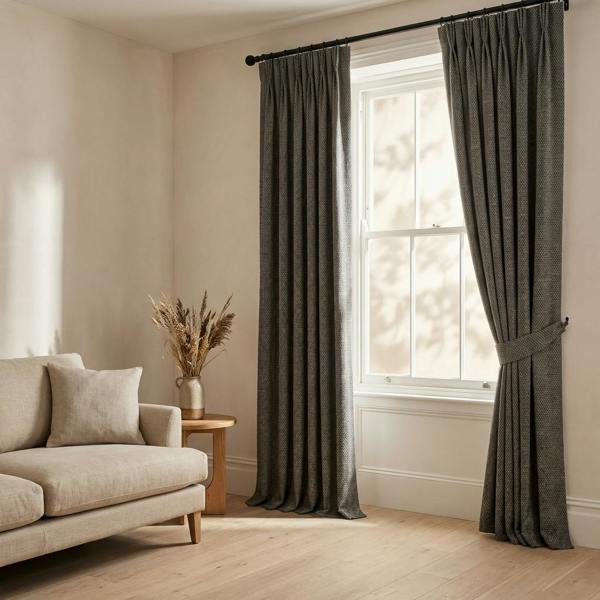 Malaga made-to-measure curtains in Charcoal, styled in a living room