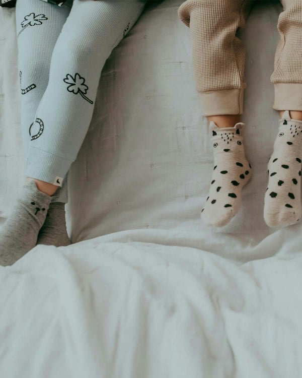 Kids wearing 3 pack unisex bear socks