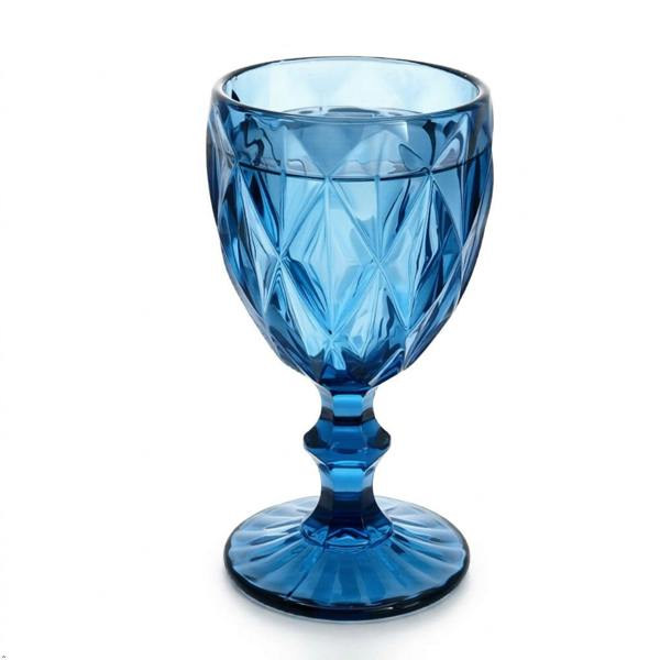 Blue glass goblet with diamond pattern on a white background