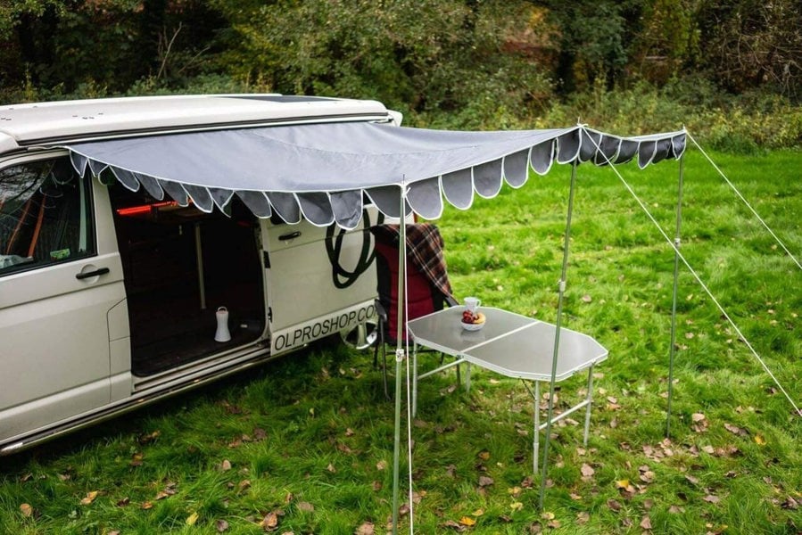 Charcoal Shade Campervan Canopy OLPRO providing cover over the door from weather