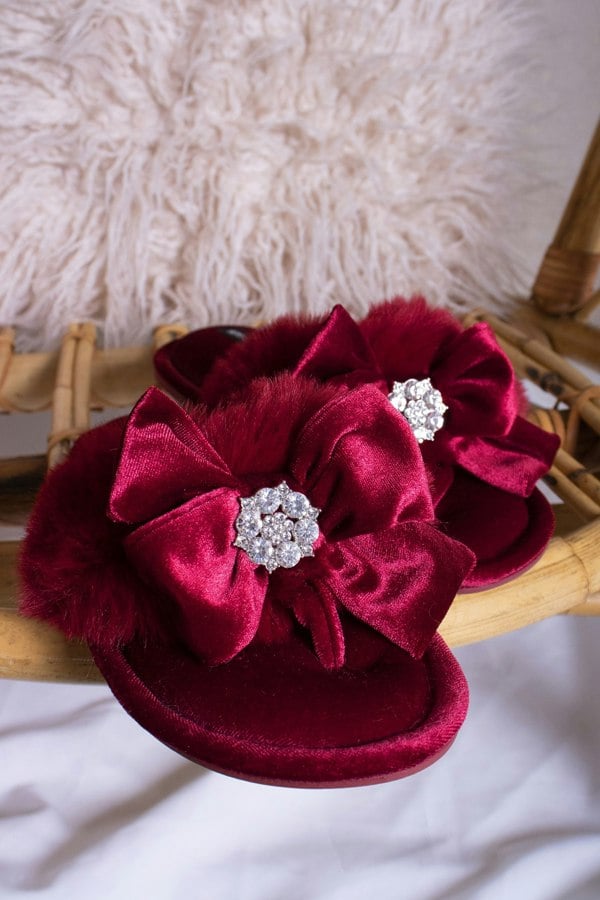 Amelie women's toe post slippers in red with a premium velvet bow and diamante embellishment atop a plush faux fur band from Pretty You London