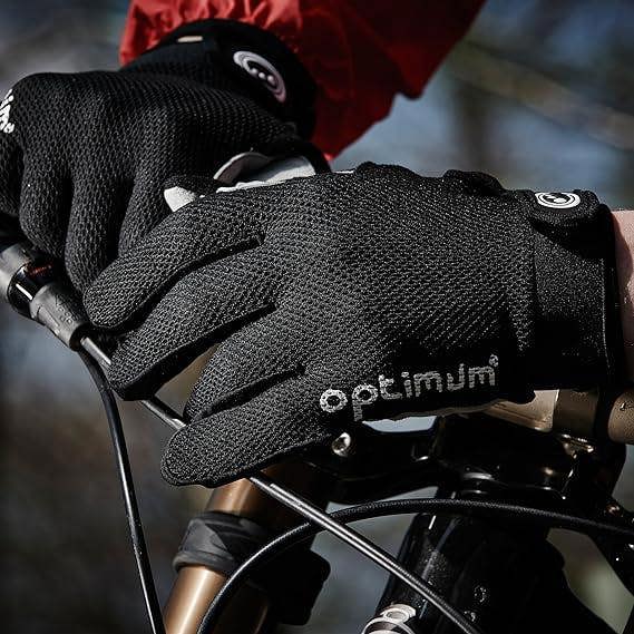 Gloved hands gripping bike handlebars wearing black Hawkley MTB cycling gloves - Optimum