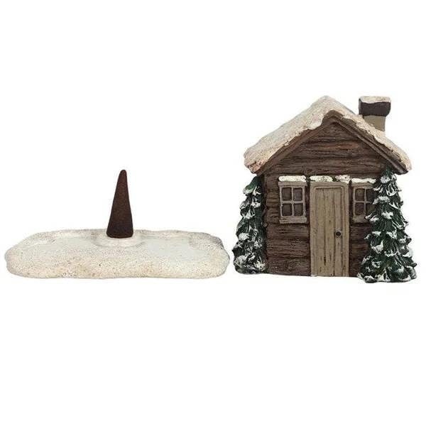 Log cabin incense cone burner with incense cone on base and small log cabin house