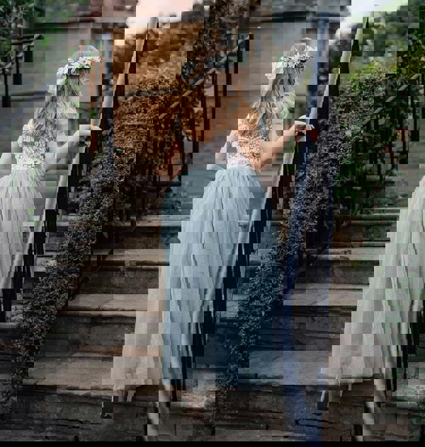 Young girl walking up on stairs