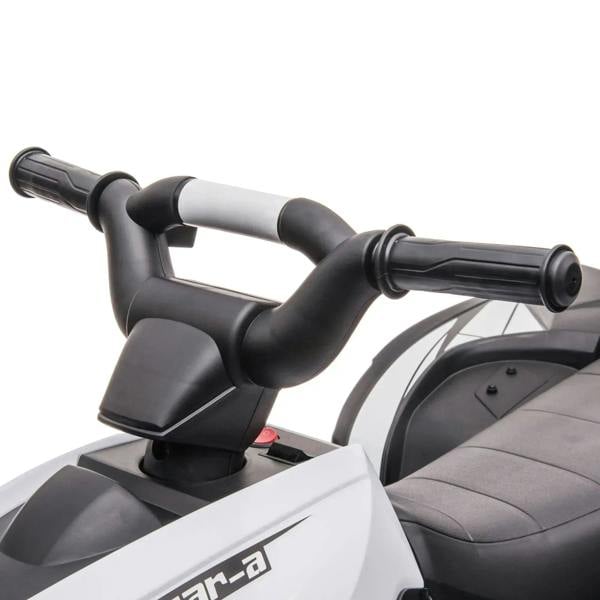 White electric quad bike handlebars and steering wheel with padded seat in view